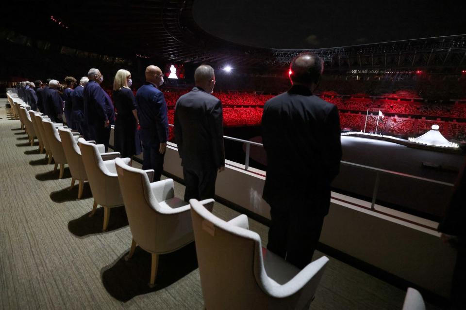 VIP officials look on during the opening ceremony.