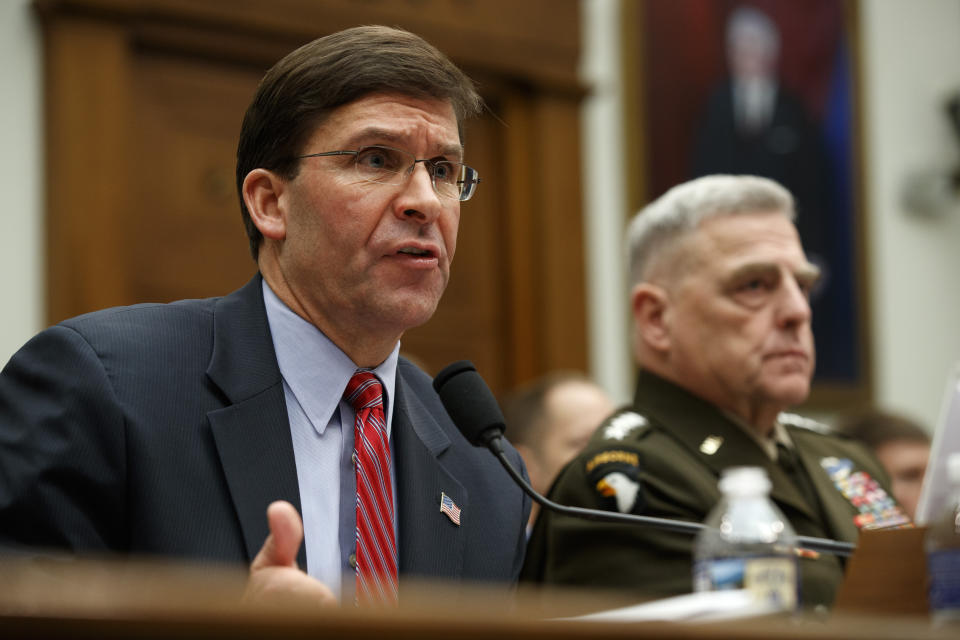 Secretary of Defense Mark Esper, left, and Chairman of the Joint Chiefs Gen. Mark Milley, testify to a House committee hearing on U.S. policy in Syria, Wednesday, Dec. 11, 2019, on Capitol Hill in Washington. (AP Photo/Jacquelyn Martin)