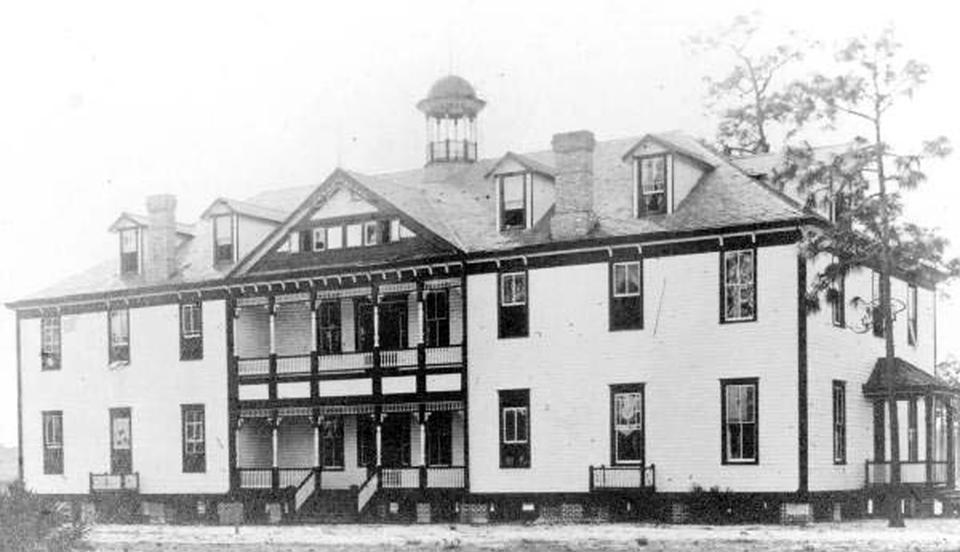 This undated photo shows the Robert Hungerford Normal and Industrial School in Eatonville, Fla. One of the first historically Black towns in the U.S. is suing the local school board to stop the sale of land that is tied up with Florida’s legacy of racial segregation and the state's fast-paced growth nowadays. An association dedicated to the preservation of the town of Eatonville’s cultural history on Friday sued the Orange County School board in Orlando, Florida. The town is perhaps best known through the writings of Harlem Renaissance author Zora Neale Hurston. (Florida State Archives/Orlando Sentinel via AP)