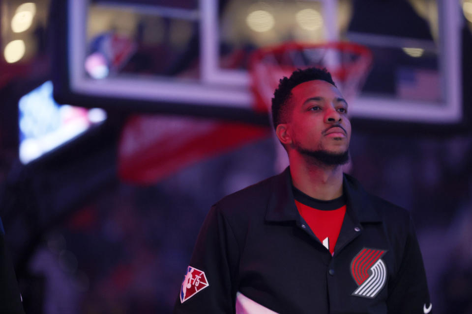 CJ McCollum of the Portland Trail Blazers stands for the national anthem.