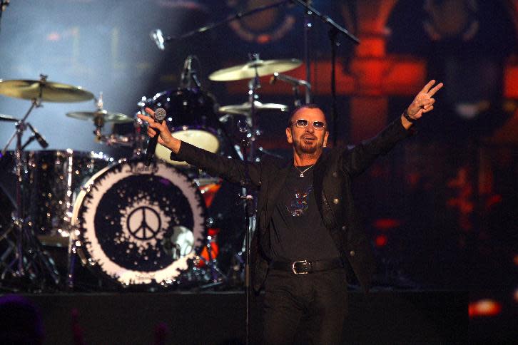 Ringo Starr performs at The Night that Changed America: a Grammy Salute to the Beatles, on Monday, Jan. 27, 2014, in Los Angeles. (Photo by Zach Cordner/Invision/AP)