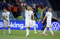 Italy's Ciro Immobile, centre, celebrates winning the Euro 2020 soccer championship group A match between Turkey and Italy at the Olympic stadium in Rome, Friday, June 11, 2021. (Ettore Ferrari/Pool via AP)