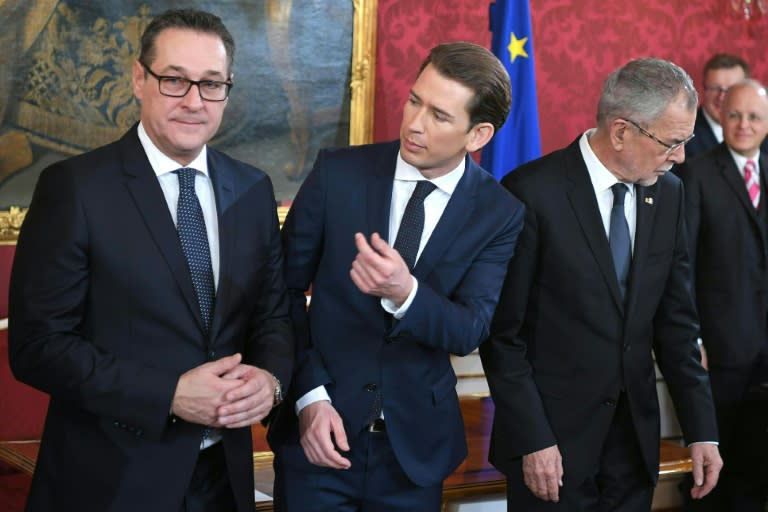 Austrian President Alexander Van der Bellen (R), Austrian Chancellor of the conservative People's Party (OeVP) Sebastian Kurz (C) formed a new coalition government