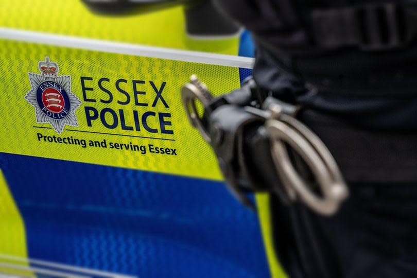 Gazette: Plea - an Essex Police Officer next to a police car