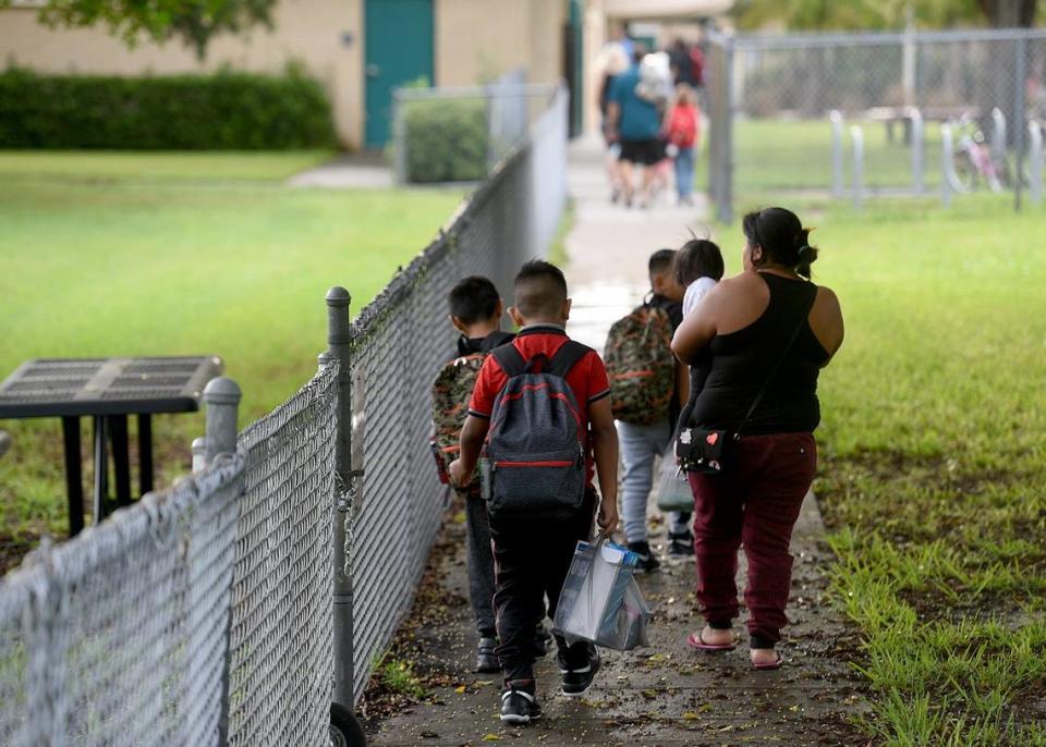 Students and parents arrive on the first day of school in 2018 at Palma Sola Elementary.