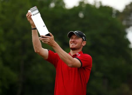 Britain Golf - BMW PGA Championship - Wentworth Club, Virginia Water, Surrey, England - 29/5/16. England's Chris Wood celebrates with the trophy after winning the BMW PGA Championship. Mandatory Credit: Action Images / Andrew Boyers Livepic