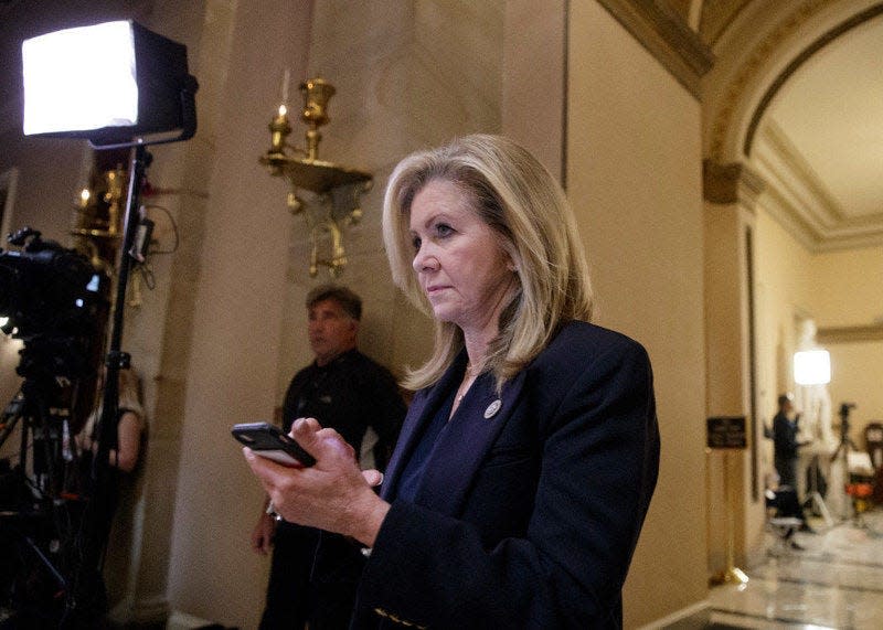 Rep. Marsha Blackburn, R-Tenn., leaves the House chamber Thursday after the House narrowly passed a GOP budget that shelves long-standing concern over federal deficits in favor of a rewrite of the tax code. AP Photo/J. SCOTT APPLEWHITE