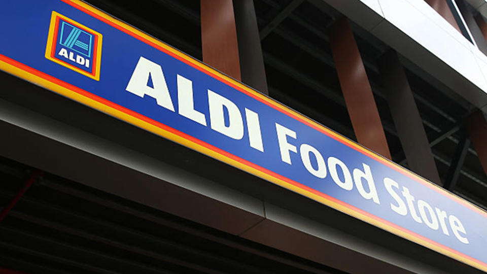 The signage for Aldi Stores Ltd. food store is seen atop one of the company's stores in Sydney, Australia, on Thursday, June 25, 2015. Photo: Getty Images.