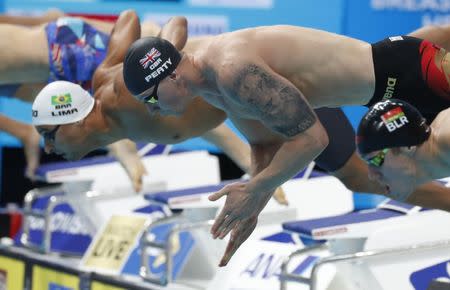 Swimming – 17th FINA World Aquatics Championships – Men's 50m Breaststroke Preliminary – Budapest, Hungary – July 25, 2017 – Adam Peaty of Britain competes. REUTERS/Laszlo Balogh