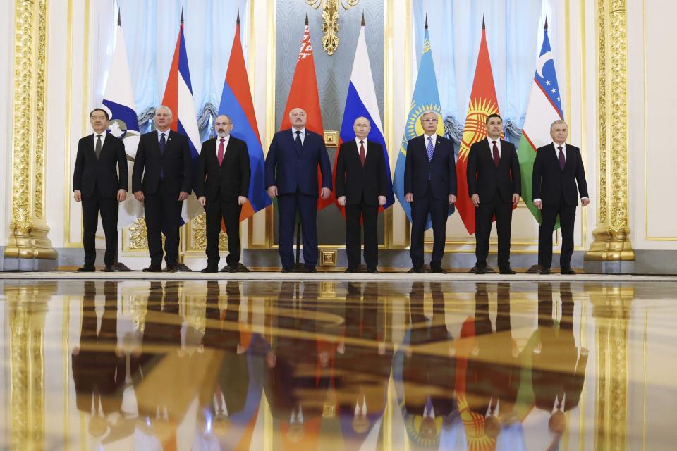 From left: Chairman of the Board of the Eurasian Economic Commission Bakytzhan Sagintayev, Cuban President Miguel Diaz-Canel, Armenian Prime Minister Nikol Pashinyan, Belarusian President Alexander Lukashenko, Russian President Vladimir Putin, Kazakh President Kassym-Jomart Tokayev, Kyrgyz President Sadyr Japarov and Uzbek President Shavkat Mirziyoyev pose for a photo during a meeting of the Eurasian Economic Union at the Kremlin in Moscow, Russia, on Wednesday, May 8, 2024. Russian President Vladimir Putin hailed the economic alliance's performance, saying that it helped boost the members' economic potential. (Alexander Kazakov, Sputnik, Kremlin Pool Photo via AP)