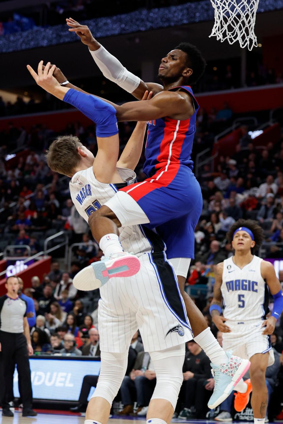 Magic center Moritz Wagner is fouled by Pistons guard Hamidou Diallo during the first half on Wednesday, Dec. 28, 2022, at Little Caesars Arena.