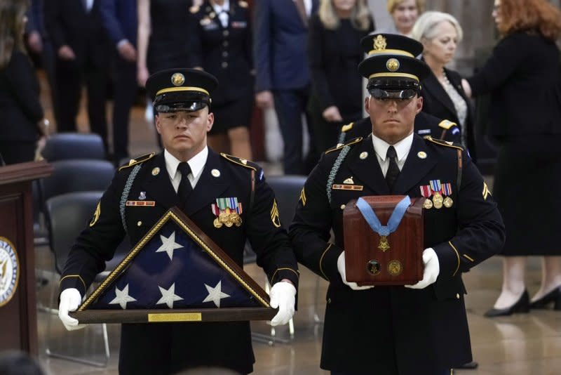 A military carry team carries the remains of retired Army Col. Ralph Puckett, the last surviving Medal of Honor recipient for acts performed during the Korean War, to lie in honor in the Rotunda at the U.S. Capitol in Washington D.C. on Monday. Pool Photo by J. Scott Applewhite/UPI