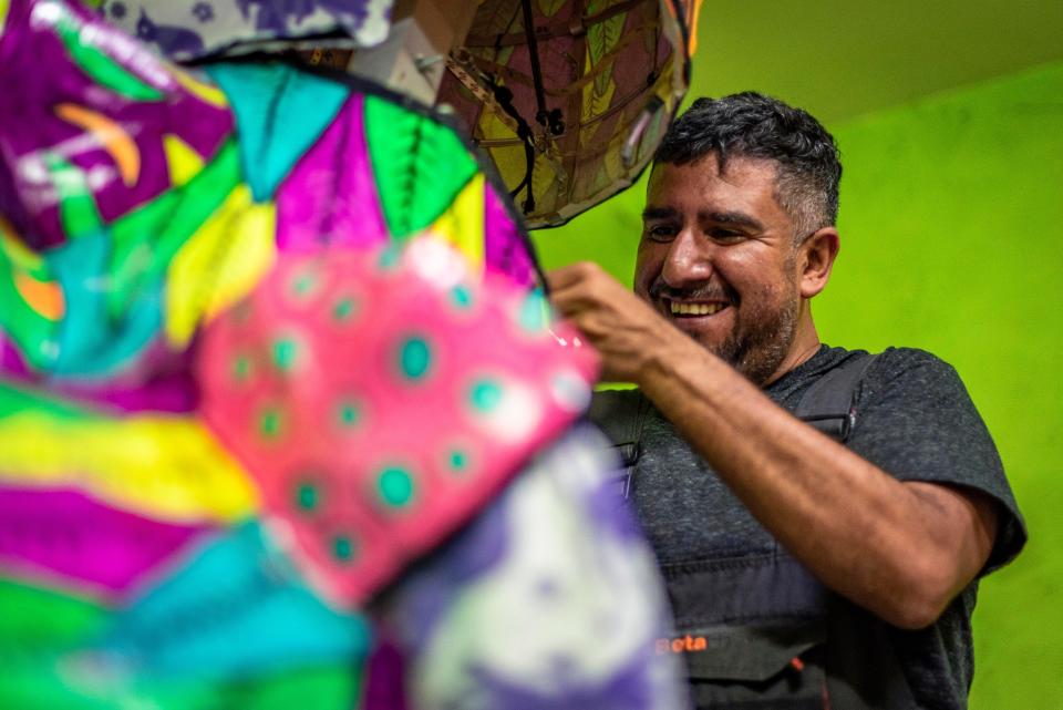 Artist Óscar Becerra Mora works on the Alebrijes exhibit at Fort Collins Museum of Discovery in 2023. Mora and fellow artist Rubén Mica will return to the museum for a multiweek residency as part of the exhibit in March.