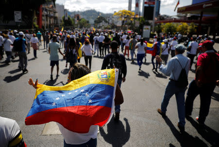 Opposition supporters take part in a rally against Venezuelan President Nicolas Maduro's government in Caracas, Venezuela February 2, 2019. REUTERS/Carlos Barria