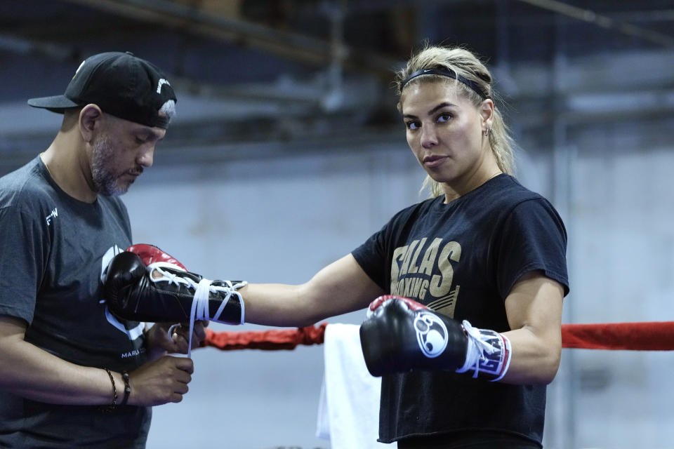 Maricela Cornejo works in the ring, Tuesday, May 30, 2023, in Detroit. The top-ranked contender will box Claressa Shields, the undisputed middleweight champion on Saturday. (AP Photo/Carlos Osorio)