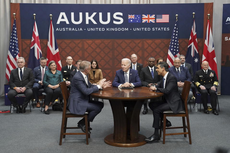 Britain's Prime Minister Rishi Sunak, right, meets with US President Joe Biden and Prime Minister of Australia Anthony Albanese, left, at Point Loma naval base in San Diego, US, Monday March 13, 2023, as part of Aukus, a trilateral security pact between Australia, the UK, and the US. (Stefan Rousseau/Pool via AP)