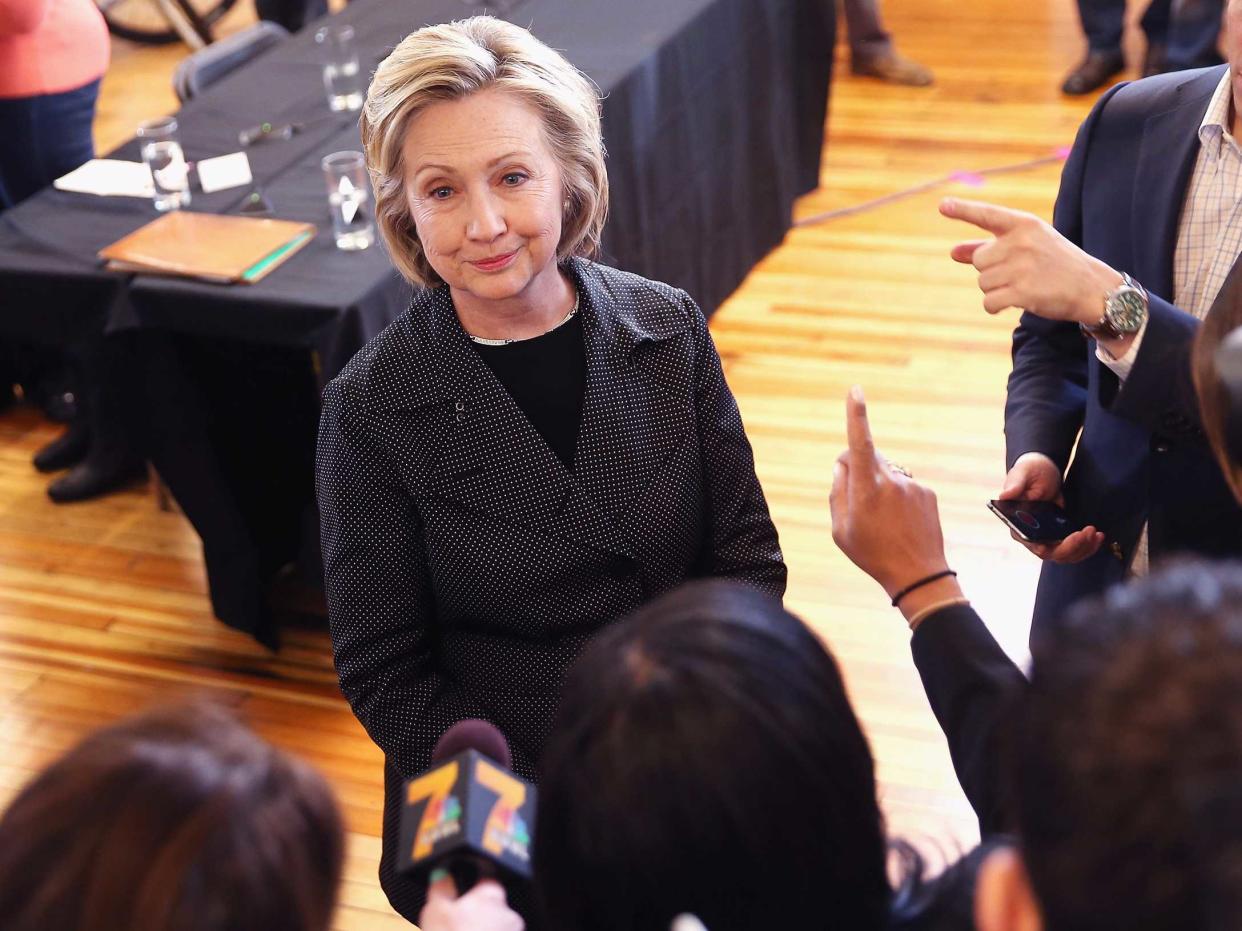 CEDAR FALLS, IA - MAY 19: Democratic presidential hopeful and former Secretary of State Hillary Clinton takes questions from the press after hosting a small business forum with members of the business and lending communities at Bike Tech bicycle shop on May 19, 2015 in Cedar Falls, Iowa. 