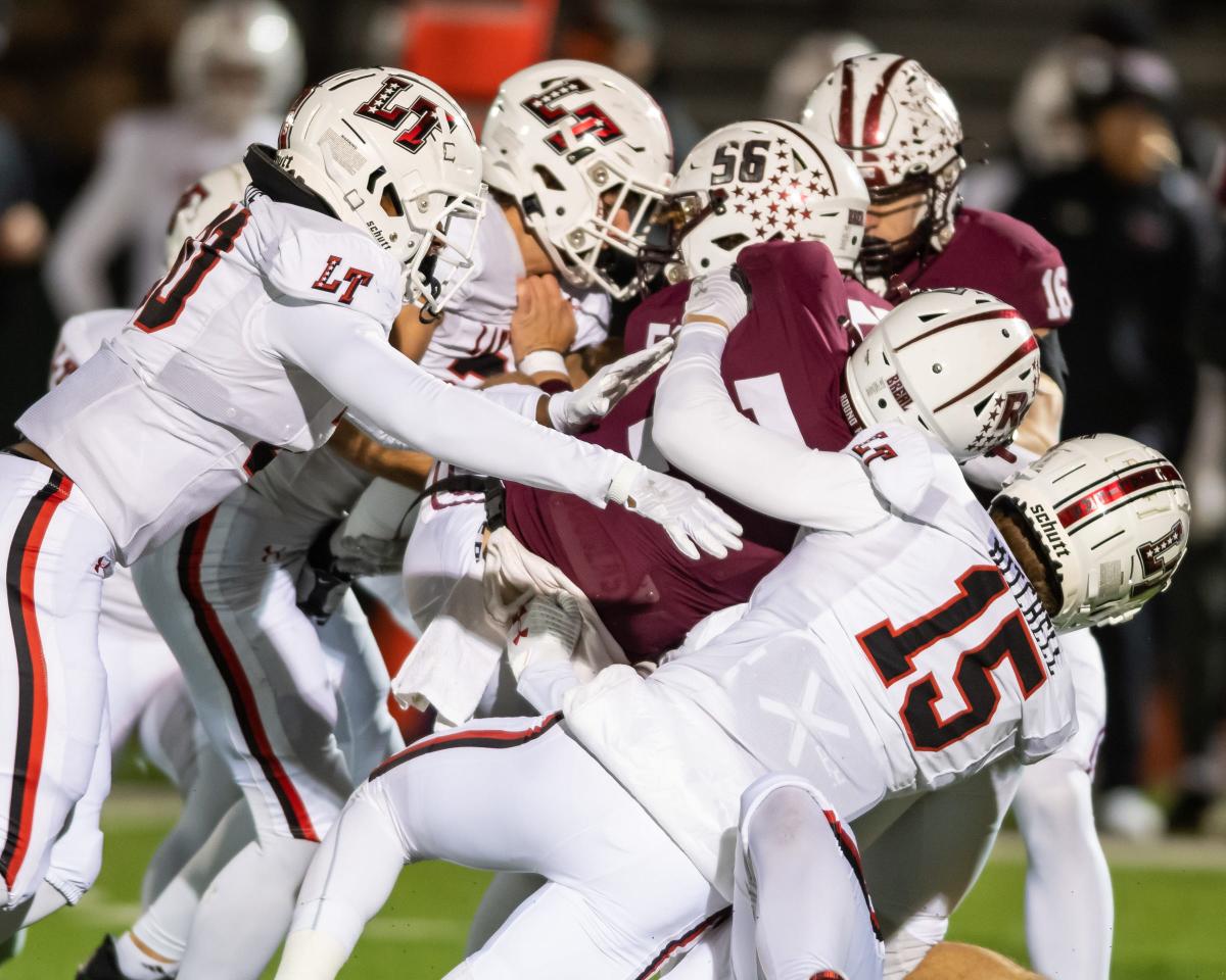 Lake Travis muscles past Round Rock in football playoff opener