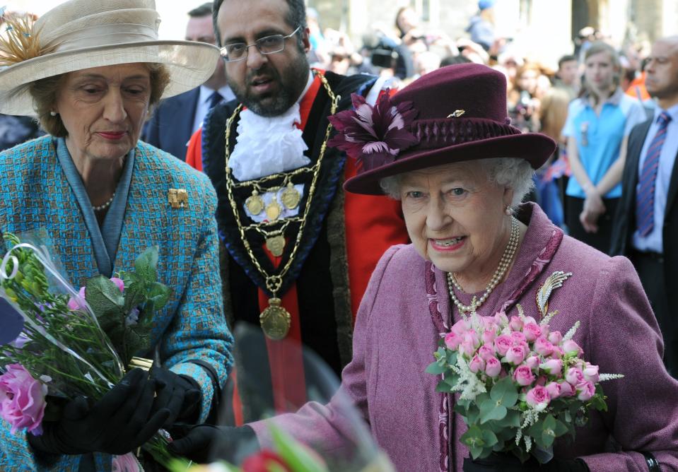 Queen Elizabeth ll, accompanied by her lady-in-waiting, Lady Susan Hussey undertakes a walkabout to mark her Diamond Jubilee on April 30, 2012.