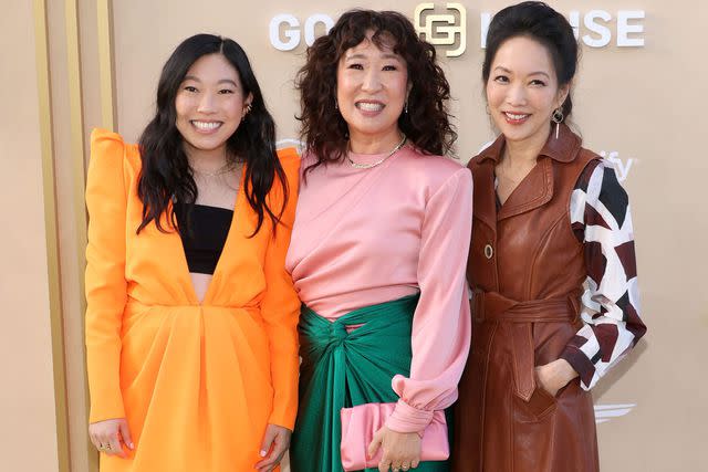 Monica Schipper/Getty From L: <em>Quiz Lady</em>'s Awkwafina, Sandra Oh and director Jessica Yu in Los Angeles on May 6, 2023