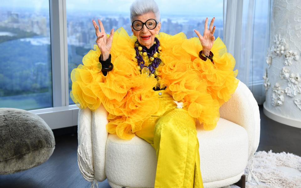 Iris Apfel sits for a portrait at her 100th birthday party at the Central Park Tower in New York in 2021