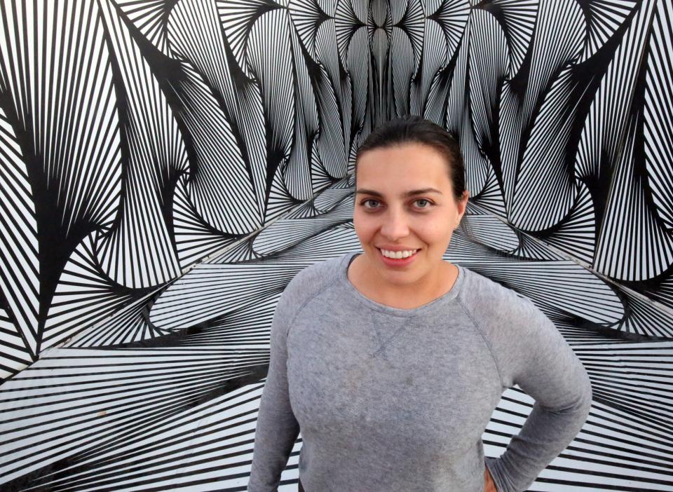 Laura Turón is opening a new art gallery, Paradox Immersive Art, at 3915 Rosa Ave., in South-Central El Paso. She is inside the Paradox Pyramid, one of the exhibits that will be unveiled at the gallery opening Friday.