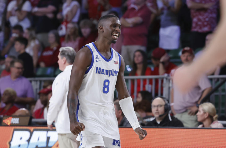 In a photo provided by Bahamas Visual Services, Memphis' David Jones celebrates the team's win over Arkansas in an NCAA college basketball game in the Battle 4 Atlantis at Paradise Island, Bahamas, Thursday, Nov. 23, 2023. (Tim Aylen/Bahamas Visual Services via AP)