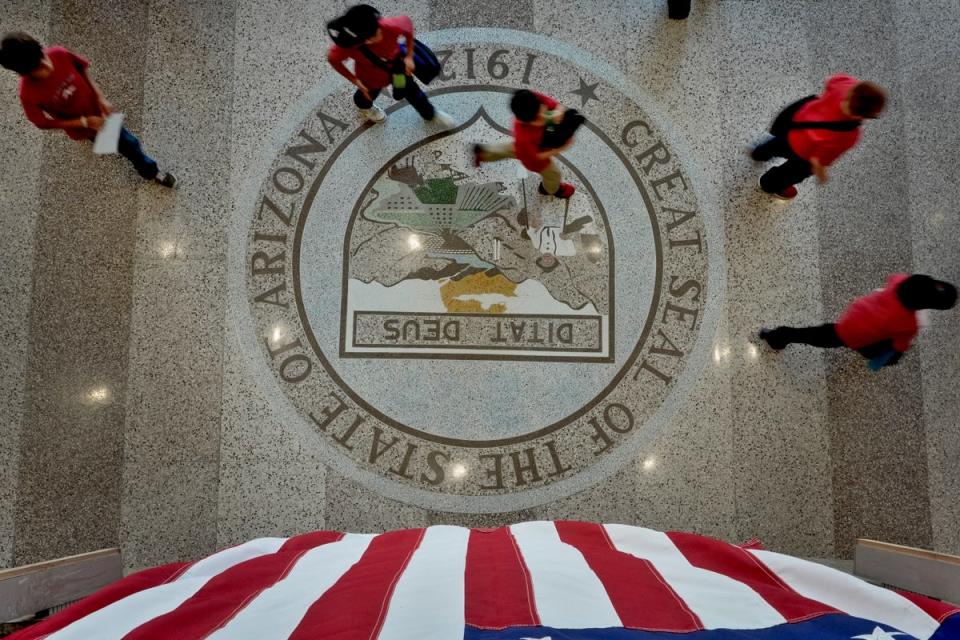 People walk to the Senate gallery to watch the proceedings, Wednesday, May 1, 2024, at the Capitol in Phoenix (AP)