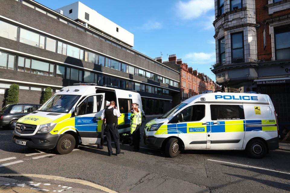 Police and ambulance at the scene of the stabbing this morning