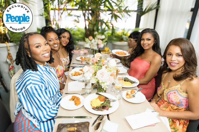 <p>Ken Jones Photography</p> Eboni K. Williams celebrates her baby shower with loved ones on June 29