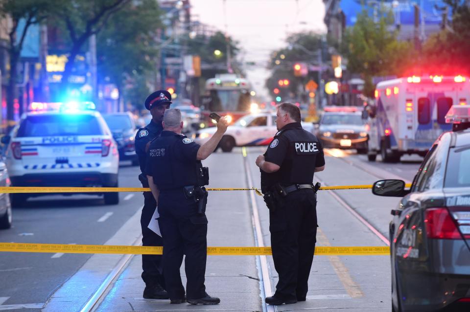 Two men have died, and a woman was rushed to hospital with serious injuries after a shooting inside the CUBE night club on Queen Street West, west of Peter Street, in Toronto on Saturday June 30, 2018. Victor Biro via ZUMA Wire/The Canadian Press