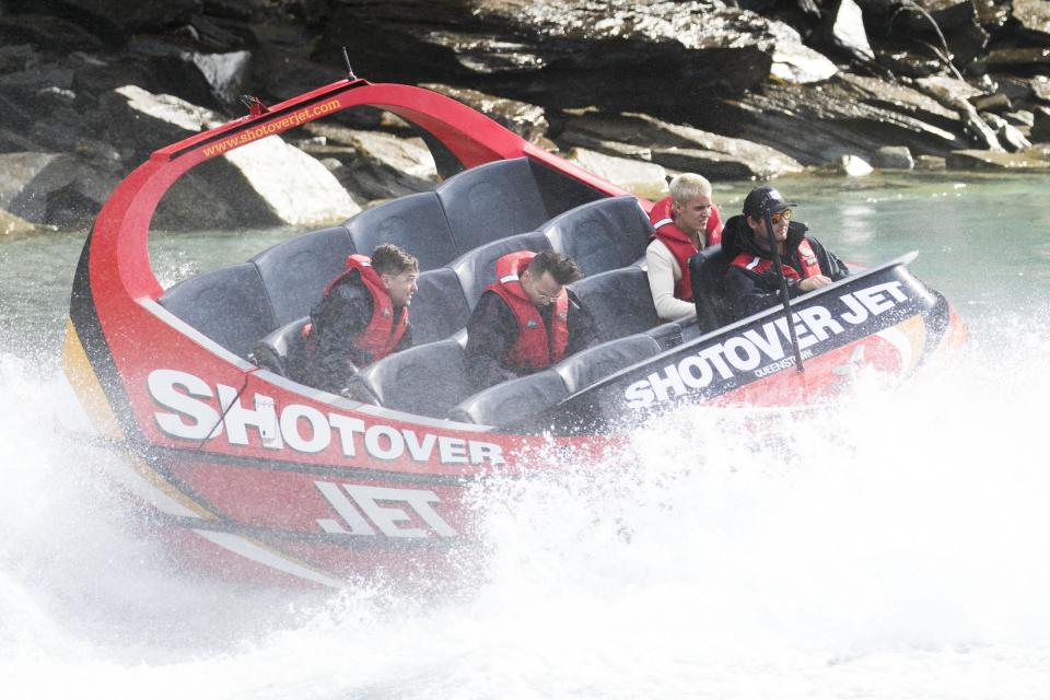 Biebs boards a boat and looks, well bored...