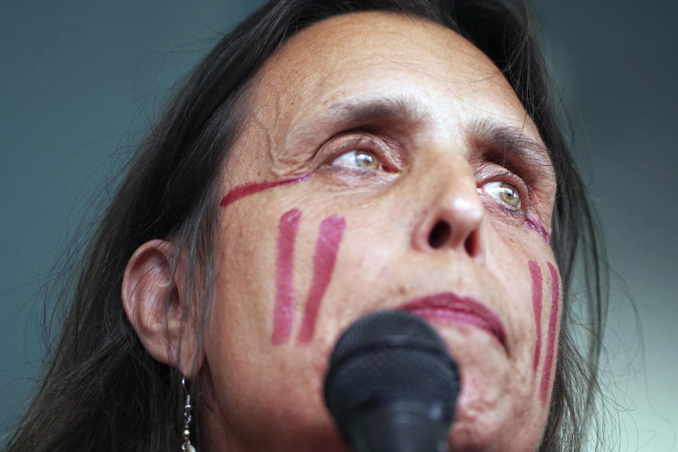 FILE - In this June 28, 2018 file photo, Winona LaDuke speaks out against the Enbridge Energy Line 3 decision, in St. Paul, Minn. June will be a critical month for Enbridge Energy's Line 3 crude oil pipeline as the company resumes construction and opponents mobilize for large-scale protests and civil disobedience. LaDuke of Honor the Earth says she expects thousands of people from across the state and country to join the protests in northern Minnesota. (Richard Tsong-Taatarii/Star Tribune via AP)