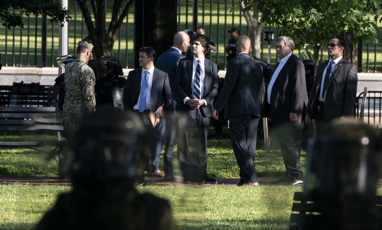 <span class="caption">William Barr walks through Lafayette Park before demonstrators were cleared by federal police on June 1, 2020.</span> <span class="attribution"><a class="link " href="https://www.gettyimages.com/detail/news-photo/attorney-general-william-barr-walks-through-lafayette-park-news-photo/1216832789?adppopup=true" rel="nofollow noopener" target="_blank" data-ylk="slk:Joshua Roberts/Getty Images;elm:context_link;itc:0;sec:content-canvas">Joshua Roberts/Getty Images</a></span>