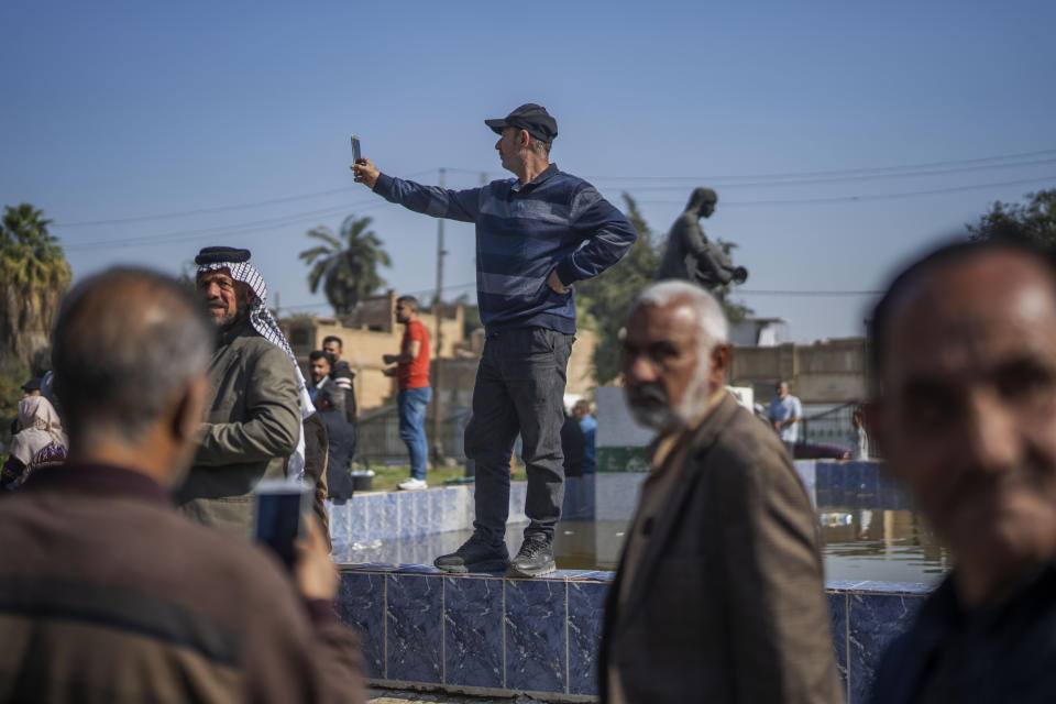 Pensioners, some of whom were prisoners of war during the first Gulf War, demonstrate outside the Green Zone in Baghdad, Iraq, Monday, Feb. 27, 2023. A U.S.-led war two decades earlier deposed a dictator whose imprisonment, torture and execution of dissenters had kept 20 million people living in fear for a quarter of a century. But it also broke what had been a unified state at the heart of the Arab world. (AP Photo/Jerome Delay)