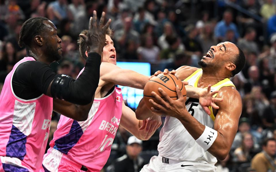 Utah Jazz guard Talen Horton-Tucker (5) is hit by New Zealand Breakers forward Tom Abercrombie (10) as he tries to drive the lane as the Jazz and the Breakers play at the Delta Center in Salt Lake City on Monday, Oct. 16, 2023. | Scott G Winterton, Deseret News
