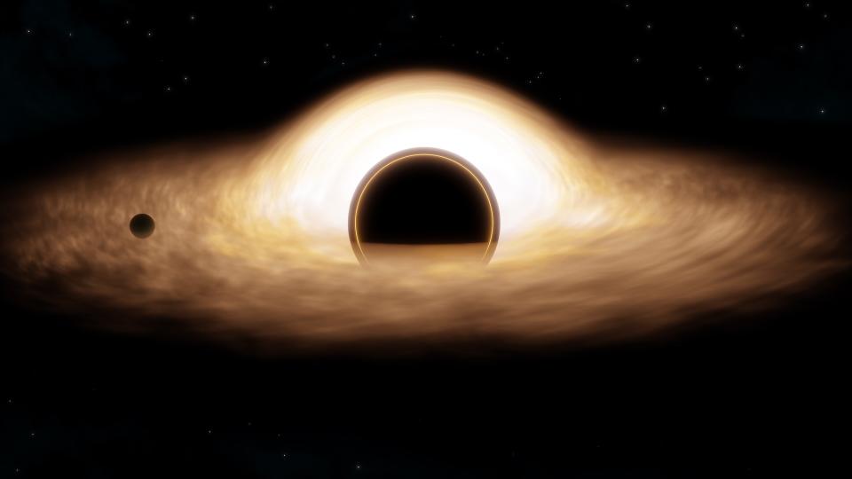  An artist's rendering of a black hole. 