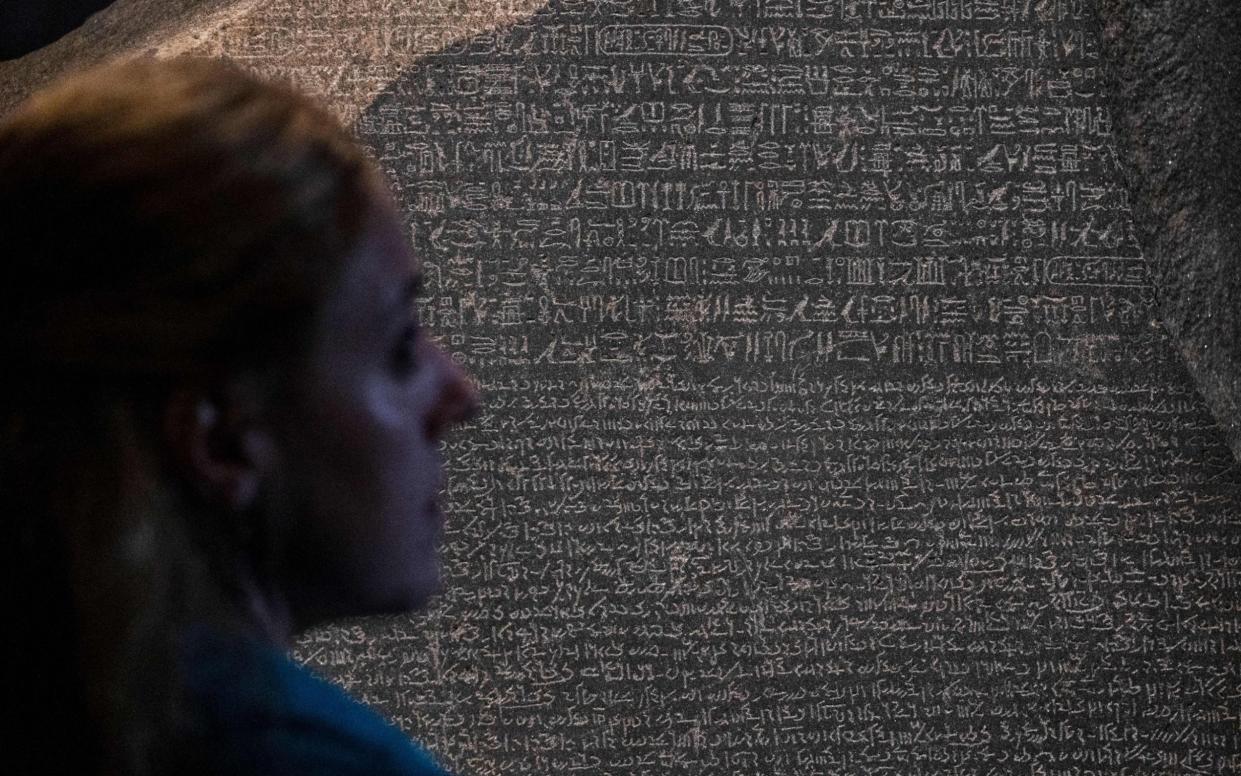 The Rosetta Stone has been the star attraction at the British Museum pretty much from the moment it was installed in 1802 - AFP
