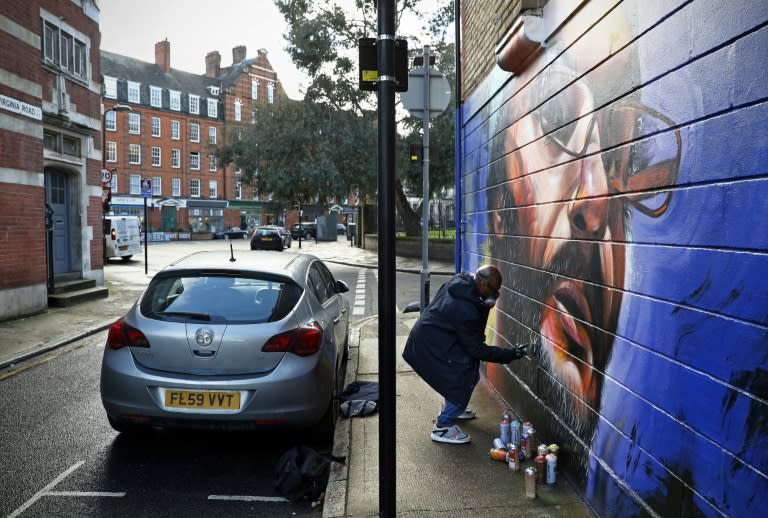 In London, he gets informal agreement to convert walls into canvases, often just knocking on people's doors to ask permission