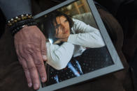 Jaime Puerta, of Santa Clarita, Calif., holds a picture of his son Daniel Joseph Puerta-Johnson, during a Senate Judiciary Committee hearing on Capitol Hill in Washington, Wednesday, Jan. 31, 2024, on child safety online. Puerta's son was 16 years old when he died of fentanyl poisoning, (AP Photo/Manuel Balce Ceneta)