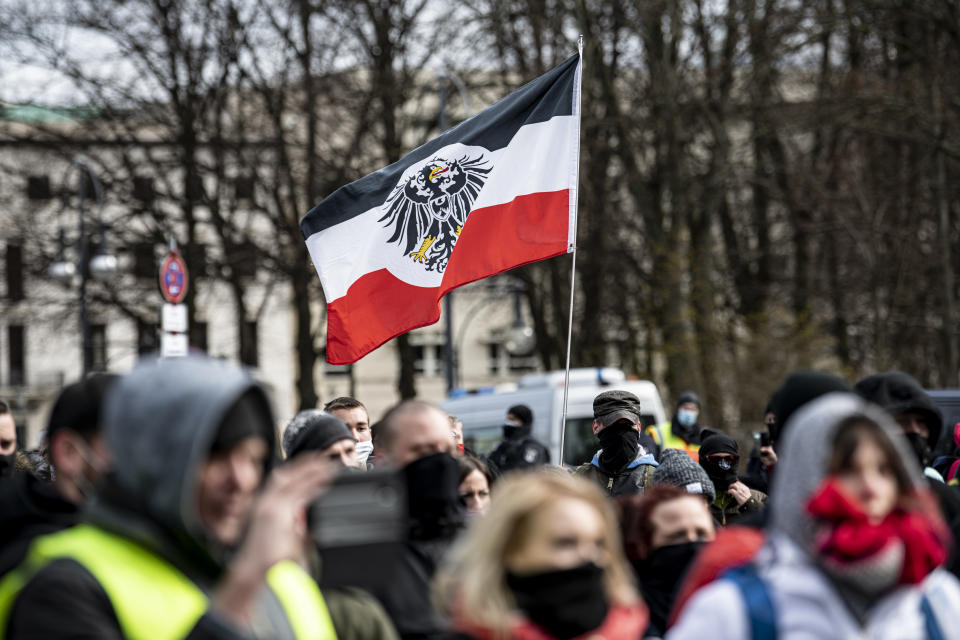 Right-wing extremists participate in a demonstration in Berlin.  