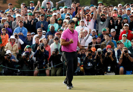 Patrick Reed of the U.S. celebrates winning the 2018 Masters tournament after final round play at the Augusta National Golf Club in Augusta, Georgia, U.S. April 8, 2018. REUTERS/Mike Segar