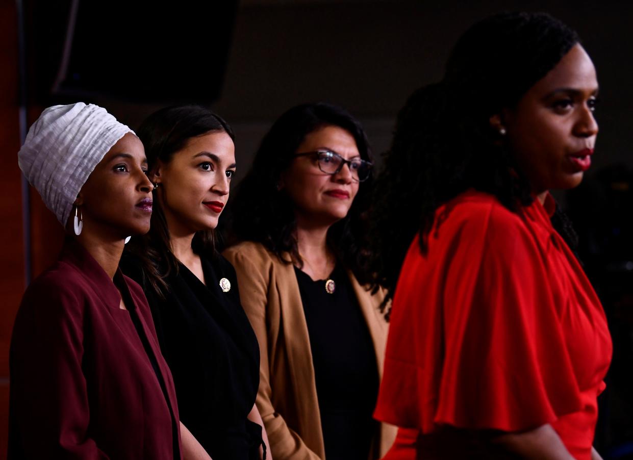 US Reps. Ayanna Pressley, D-Mass., speaks as, from left, Ilhan Abdullahi Omar, D-Minn., Rashida Tlaib, D-Mich., and Alexandria Ocasio-Cortez, D-N.Y., hold a press conference, in 2019.