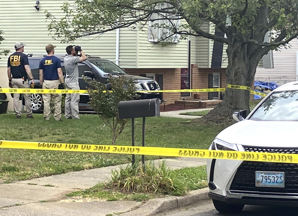 The FBI and other law enforcement agencies, investigate the scene Monday, June 12, 2023 where six people were shot, three fatally, at a home on Paddington Place in Annapolis, Md. on Sunday evening. (Luke Parker/The Baltimore Sun via AP)