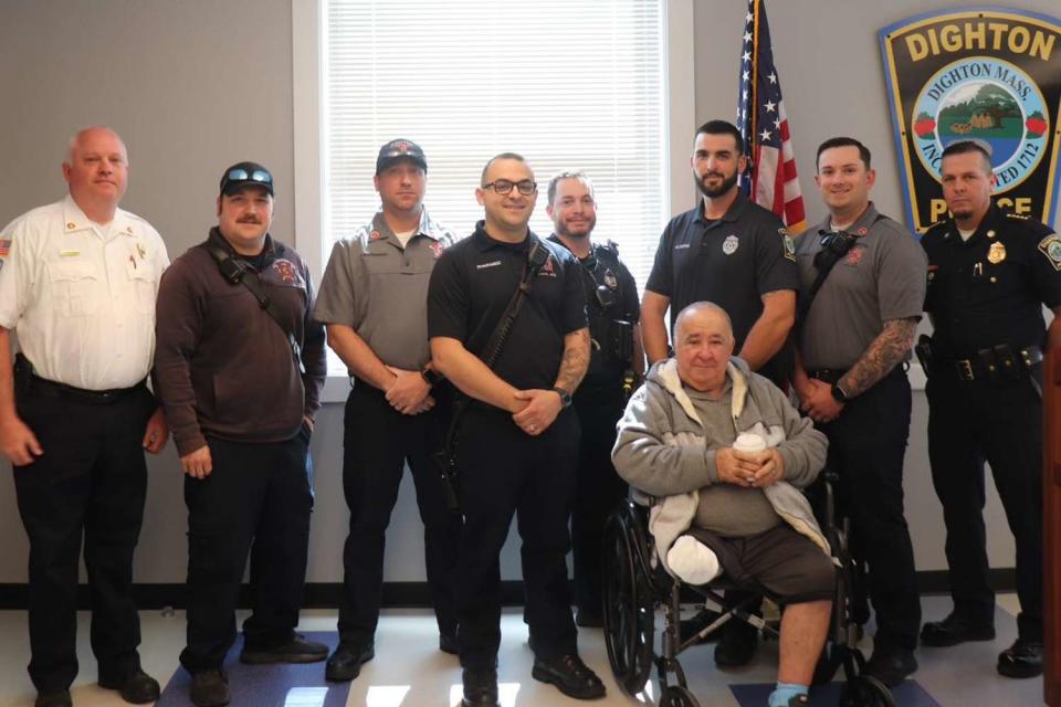 <p> Dighton Firefighters Local 4332/Facebook</p> Manuel “Manny” Teixeira reunites with first responders who helped save his life after a tree fell on him in March