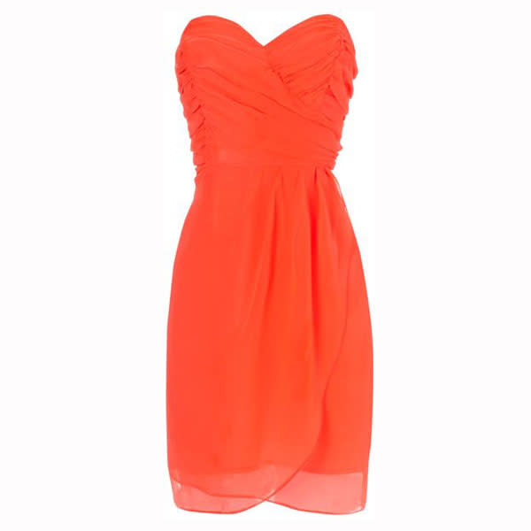 <a href="http://www.houseoffraser.co.uk/Jane+Norman+Neon+ruffle+prom+dress/173104735,default,pd.html" rel="nofollow noopener" target="_blank" data-ylk="slk:Jane Norman Neon Ruffle Prom Dress - £25 – House of Fraser;elm:context_link;itc:0;sec:content-canvas" class="link "><b>Jane Norman Neon Ruffle Prom Dress - £25 – House of Fraser</b></a><br><br>Team this bright orange dress with black tights and a fitted black blazer to tone down the colour.