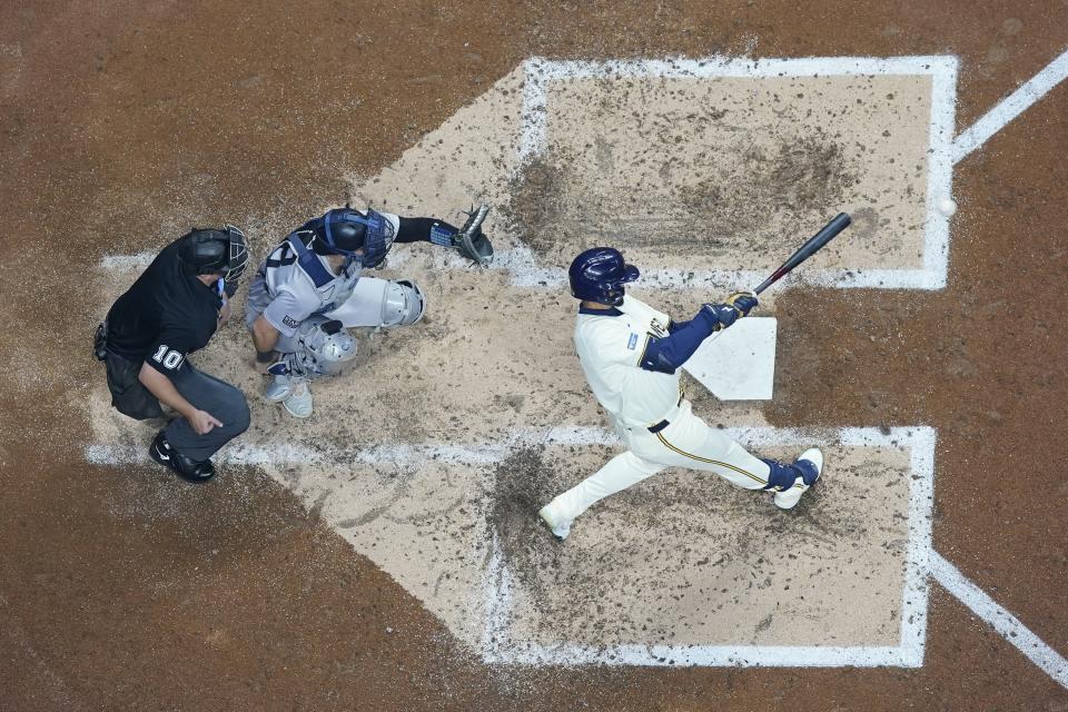 Milwaukee Brewers' Blake Perkins hits a two-run home run during the third inning of a baseball game against the New York Yankees Friday, April 26, 2024, in Milwaukee. (AP Photo/Morry Gash)