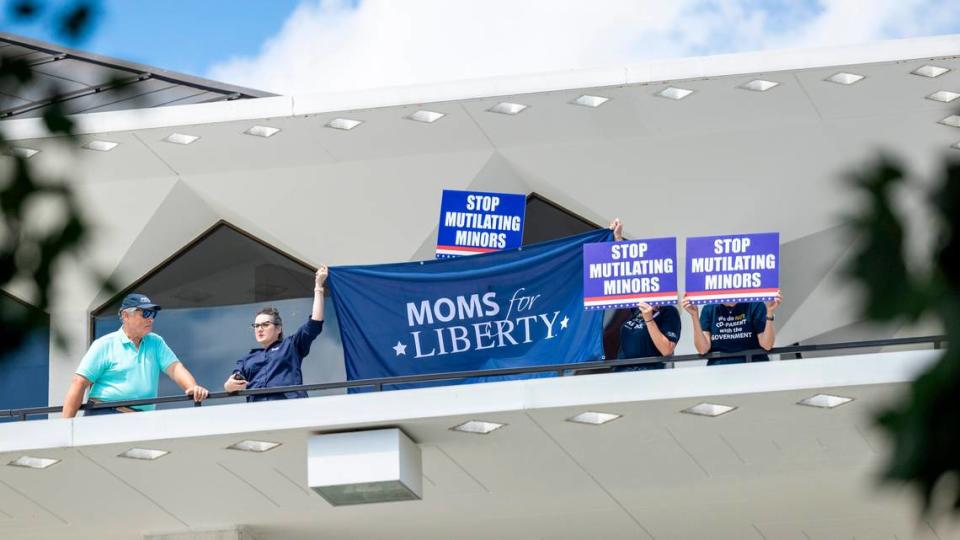 Supporters of veto overrides of bills banning transgender athletes and restrictions on gender-affirming care for minors counterprotest a press conference held by LBGTQ+ advocates at the Legislative Building in Raleigh on Wednesday, Aug 16, 2023.