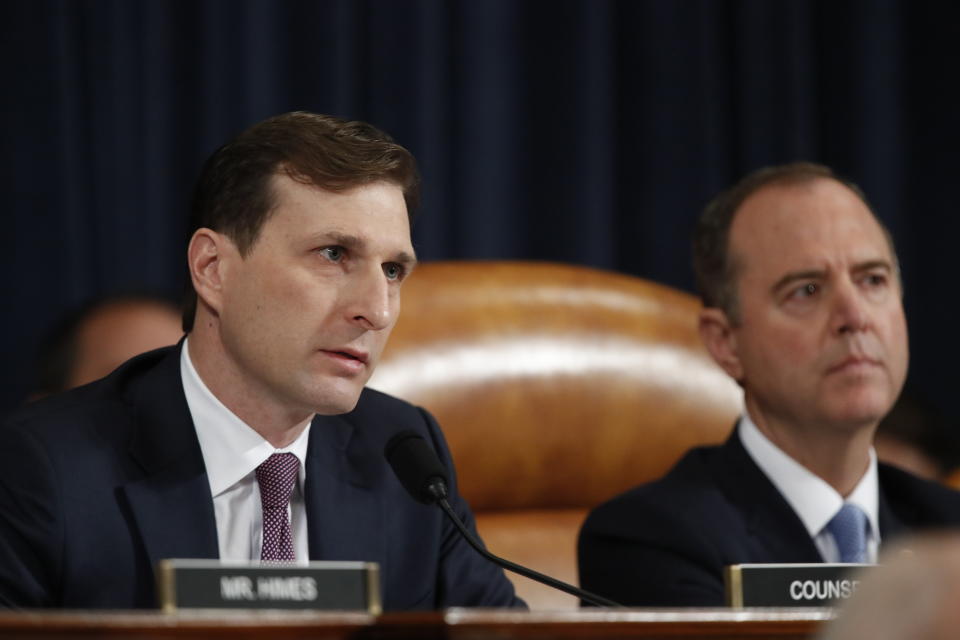 Daniel Goldman, director of investigations for the House Intelligence Committee majority staff, left, asks questions to top U.S. diplomat in Ukraine William Taylor and career Foreign Service officer George Kent, as they testify before the House Intelligence Committee on Capitol Hill in Washington, Wednesday, Nov. 13, 2019, during the first public impeachment hearing of President Donald Trump's efforts to tie U.S. aid for Ukraine to investigations of his political opponents. House Intelligence Committee Chairman Rep. Adam Schiff, D-Calif., right, looks on. (AP Photo/Alex Brandon)