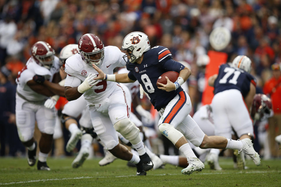 Auburn quarterback Jarrett Stidham (8) runs the ball during the first half of the Iron Bowl on Nov. 25, 2017. (AP)